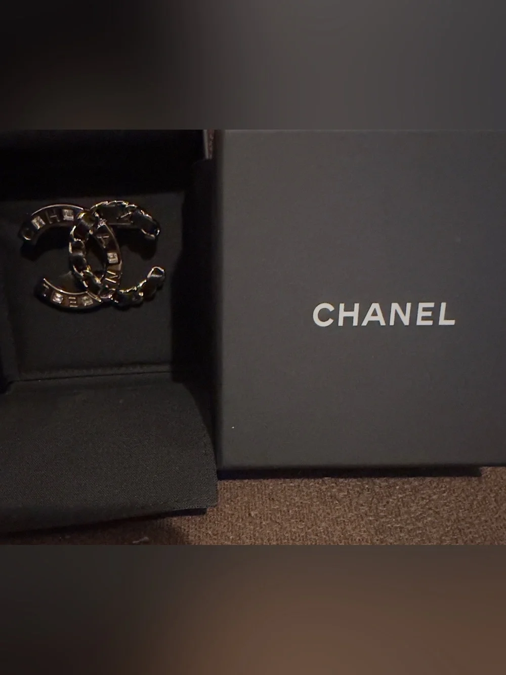 LIKE NEW CHANEL Gold and Black Interlocking CC Logo Brooch. 19S Collection.